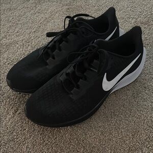 Nike Black and White Athletic Shoes with Mesh Upper